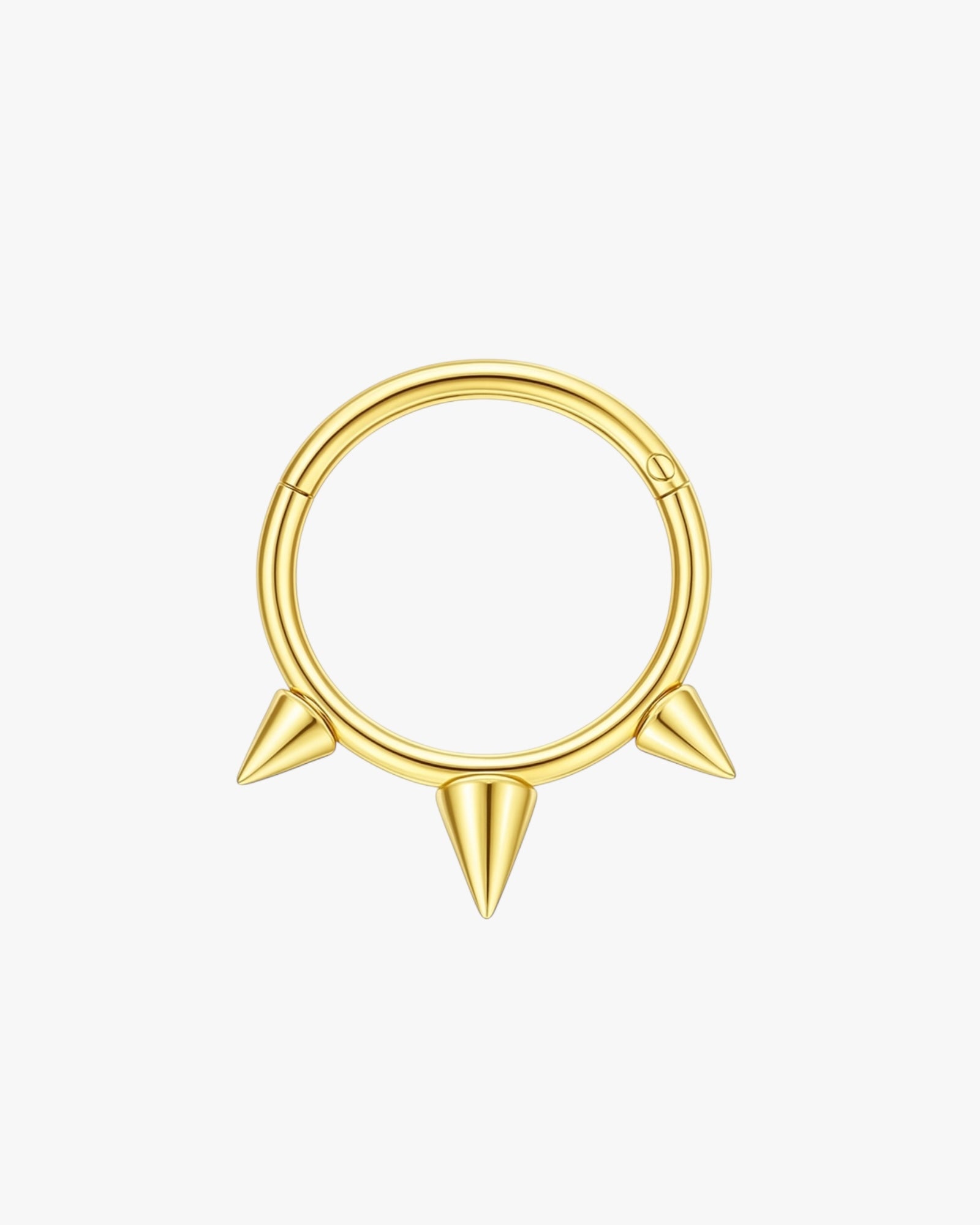 Gold septum ring with spike design on a white background