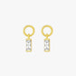 Gold earrings with rectangular gemstones on a white background