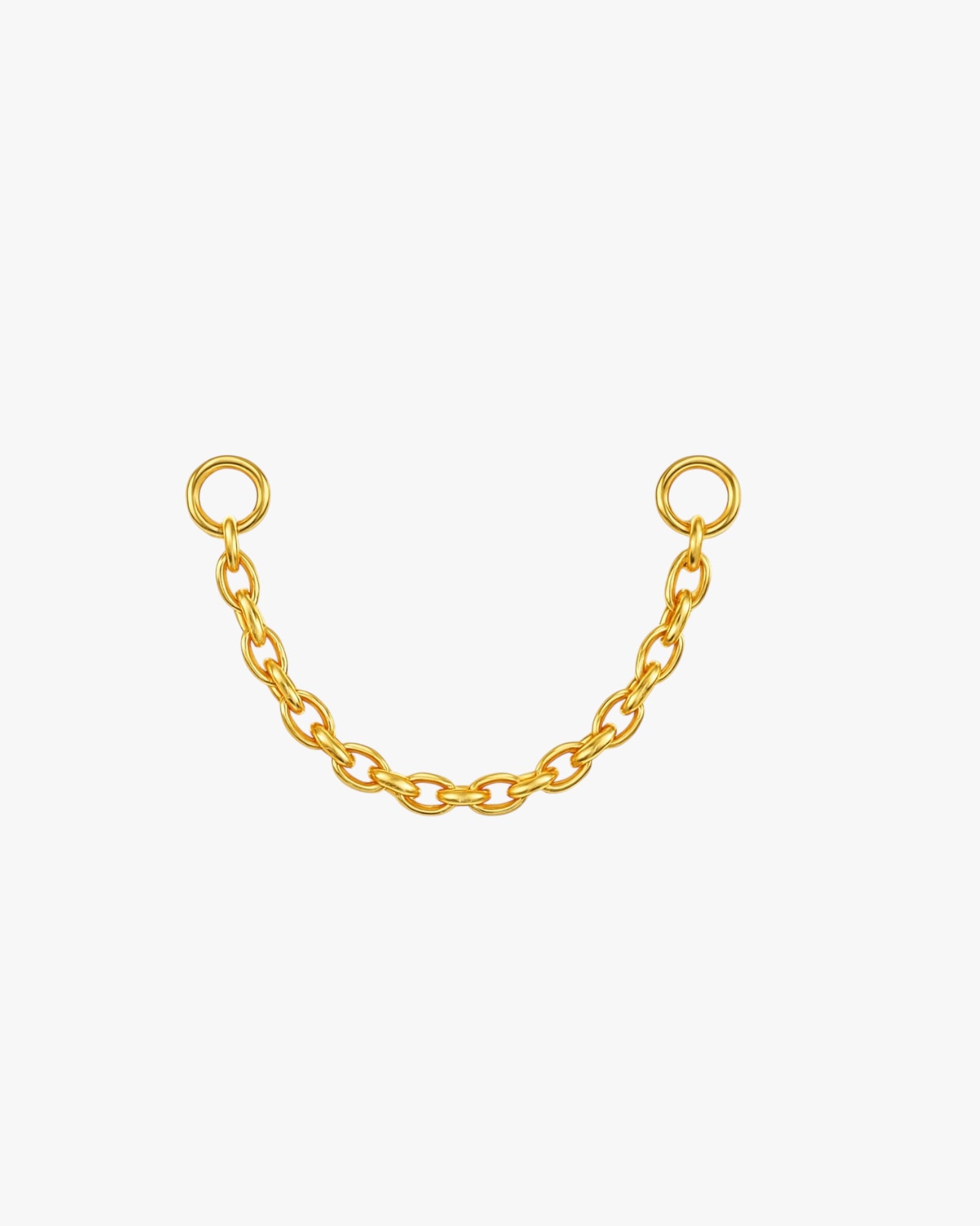 Gold chain with eyelets on a white background