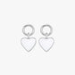 Pair of silver heart-shaped earrings on a white background