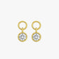Gold earrings with round gemstones on a light gray background