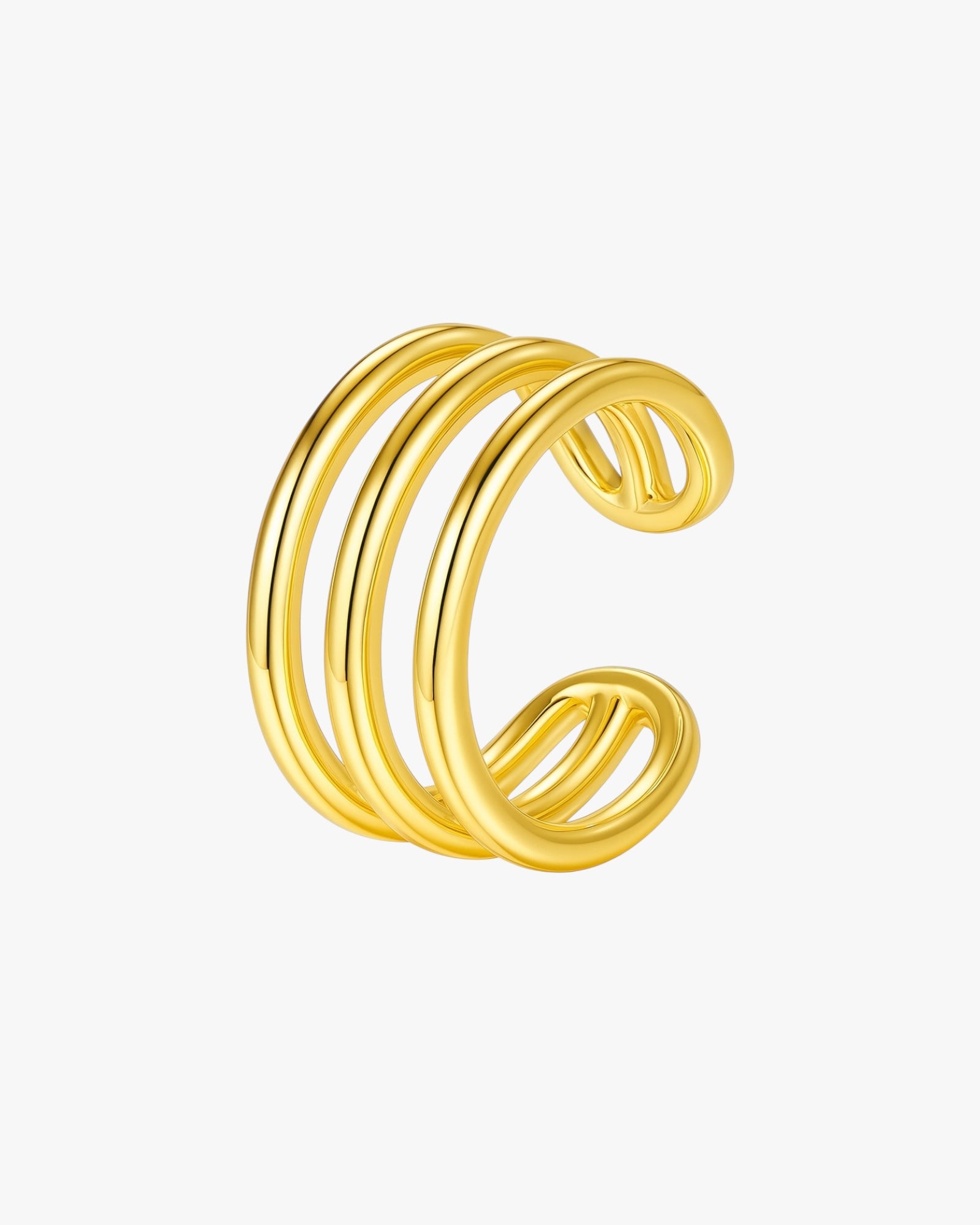 Gold ear cuff  on a white background