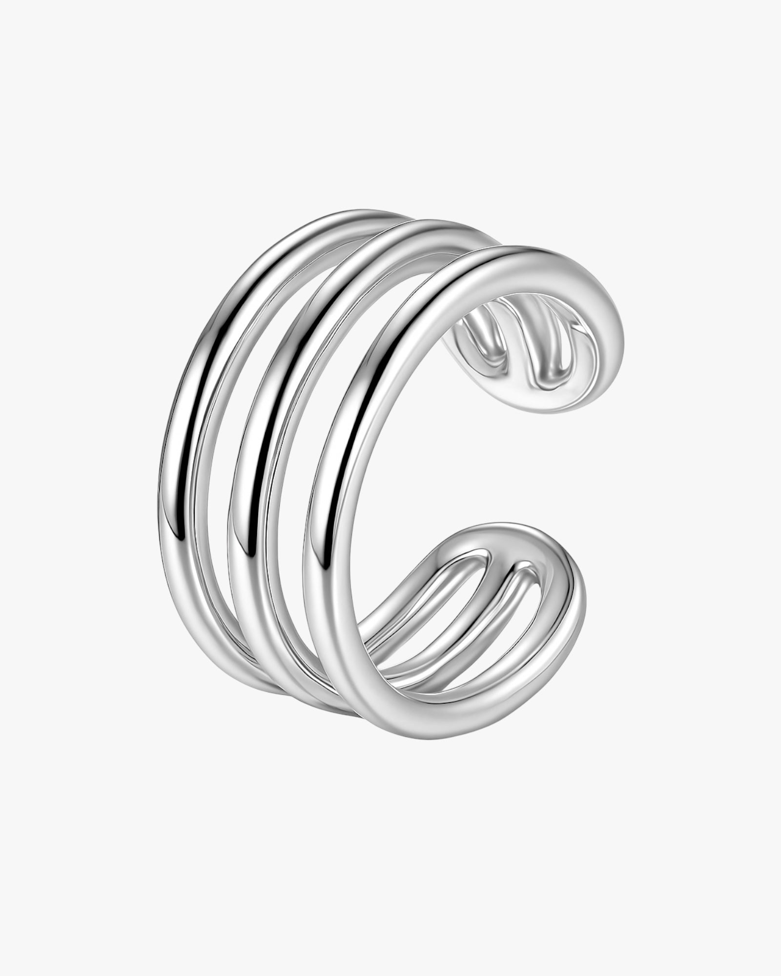 Silver ear cuff with a ribbed design on a white background