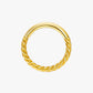 Gold hoop earring on a white background