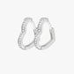 Pair of silver hoop earrings with small stones on a white background