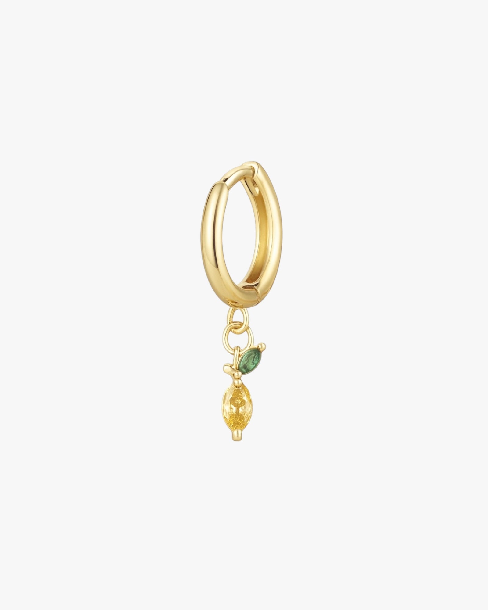 Gold hoop earring with a small green gemstone and yellow bead on a white background