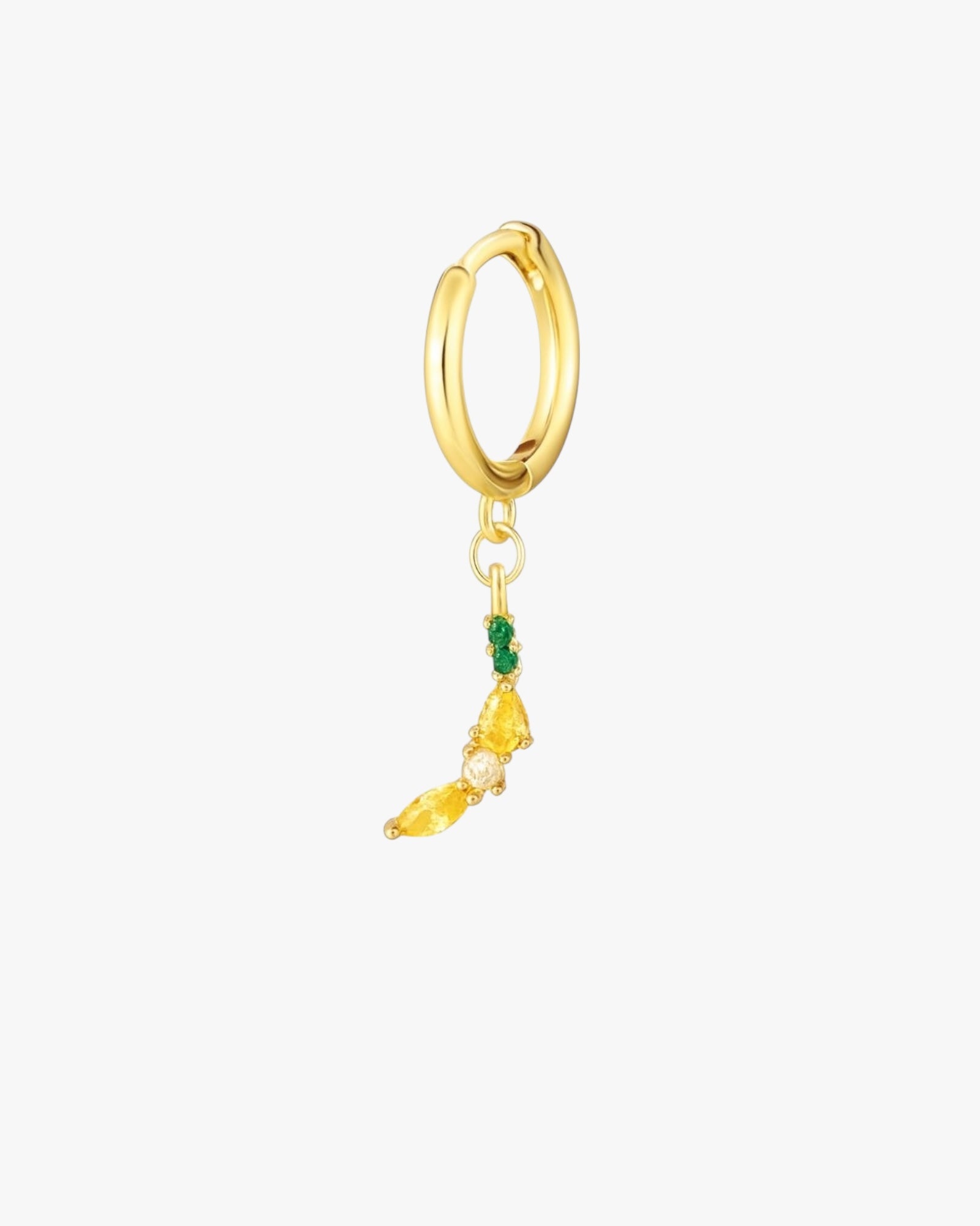 Gold earring with green and yellow elements on a white background