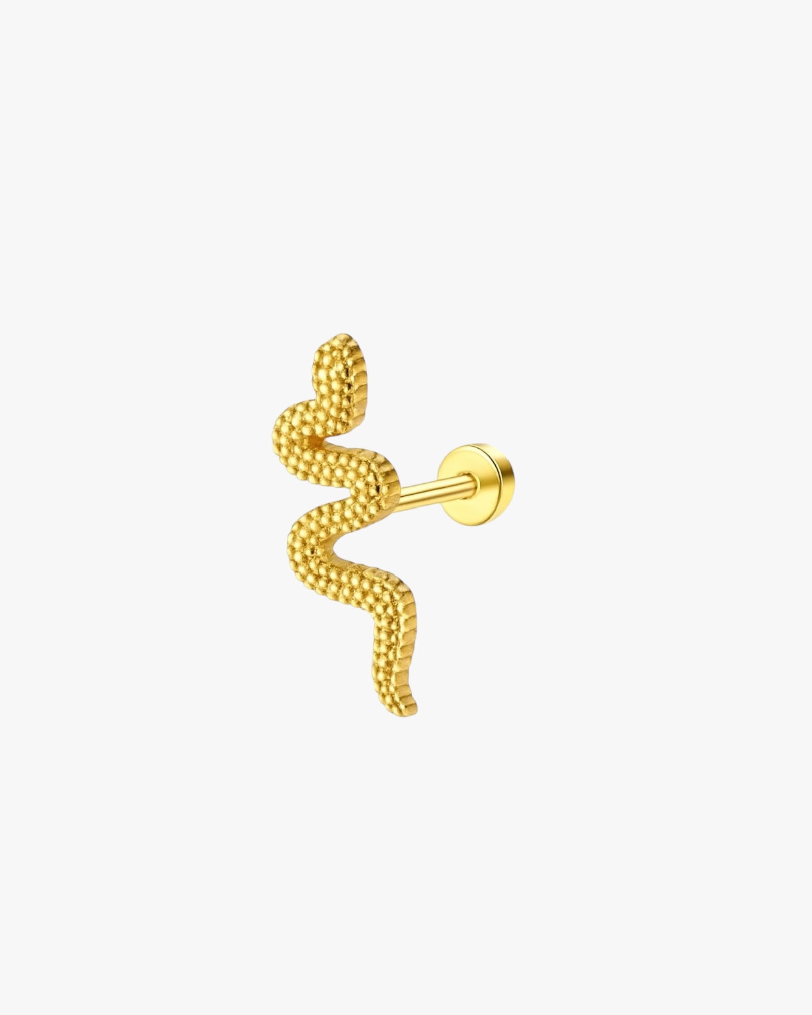 Gold spiral earring on a white background
