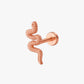 Rose gold snake-shaped earring on a white background