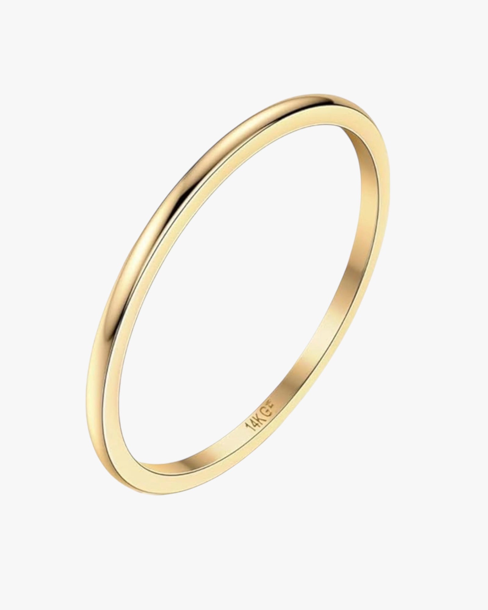 A gold-plated stainless steel band ring with a textured surface.