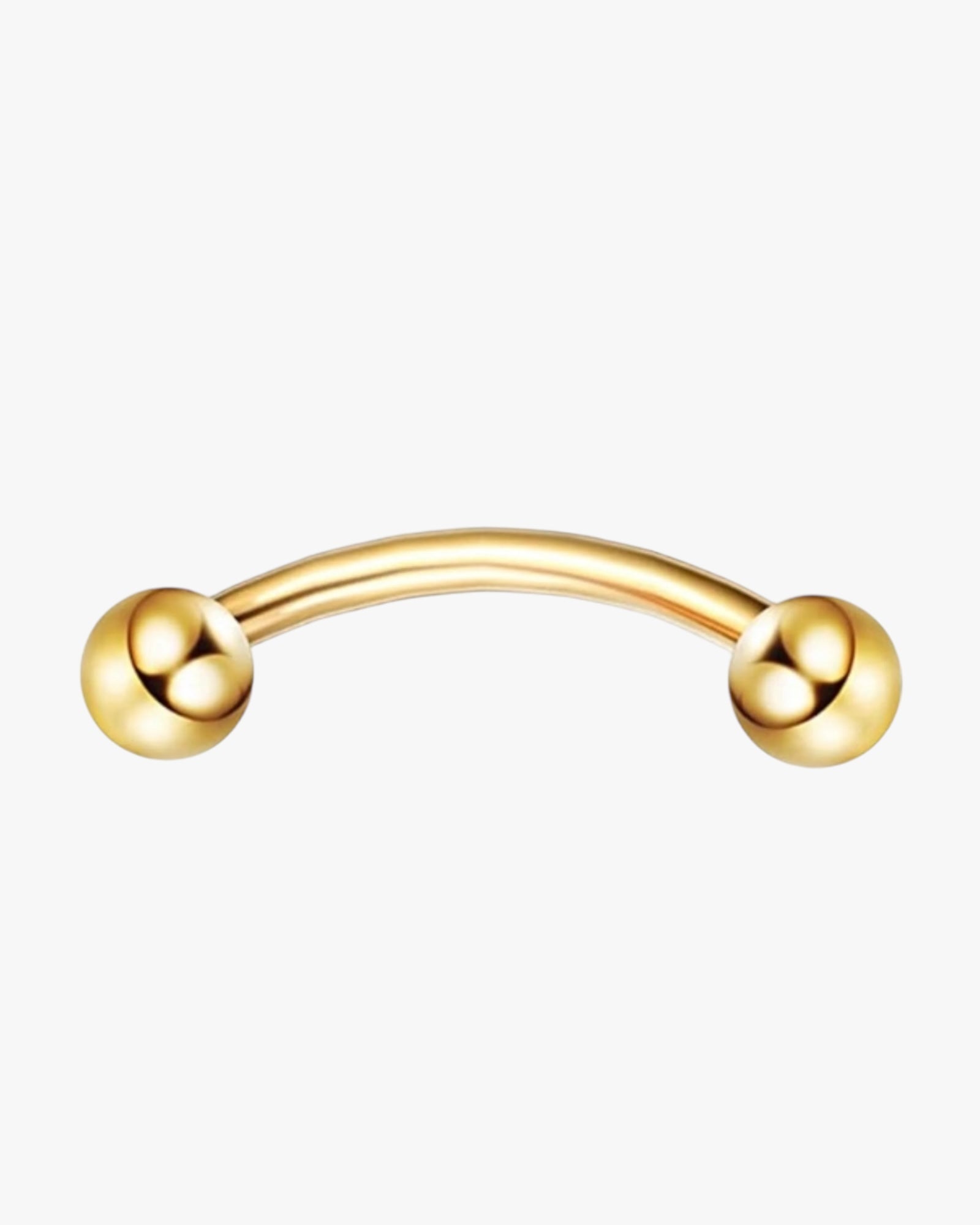 A gold-colored curved barbell with two spherical ends, designed for use as body jewelry.