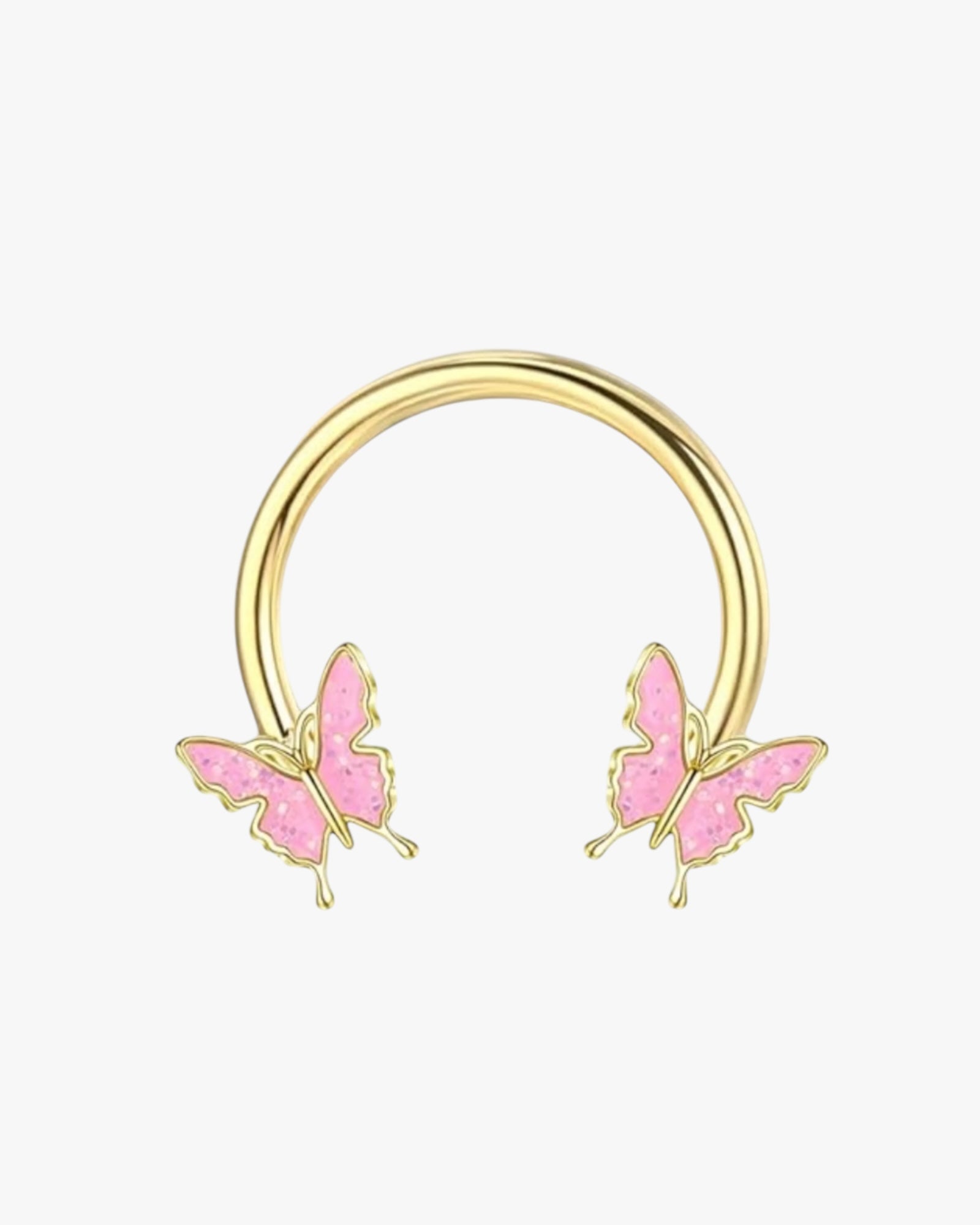 A gold-colored hoop earring with two pink butterfly designs on it, against a white background.