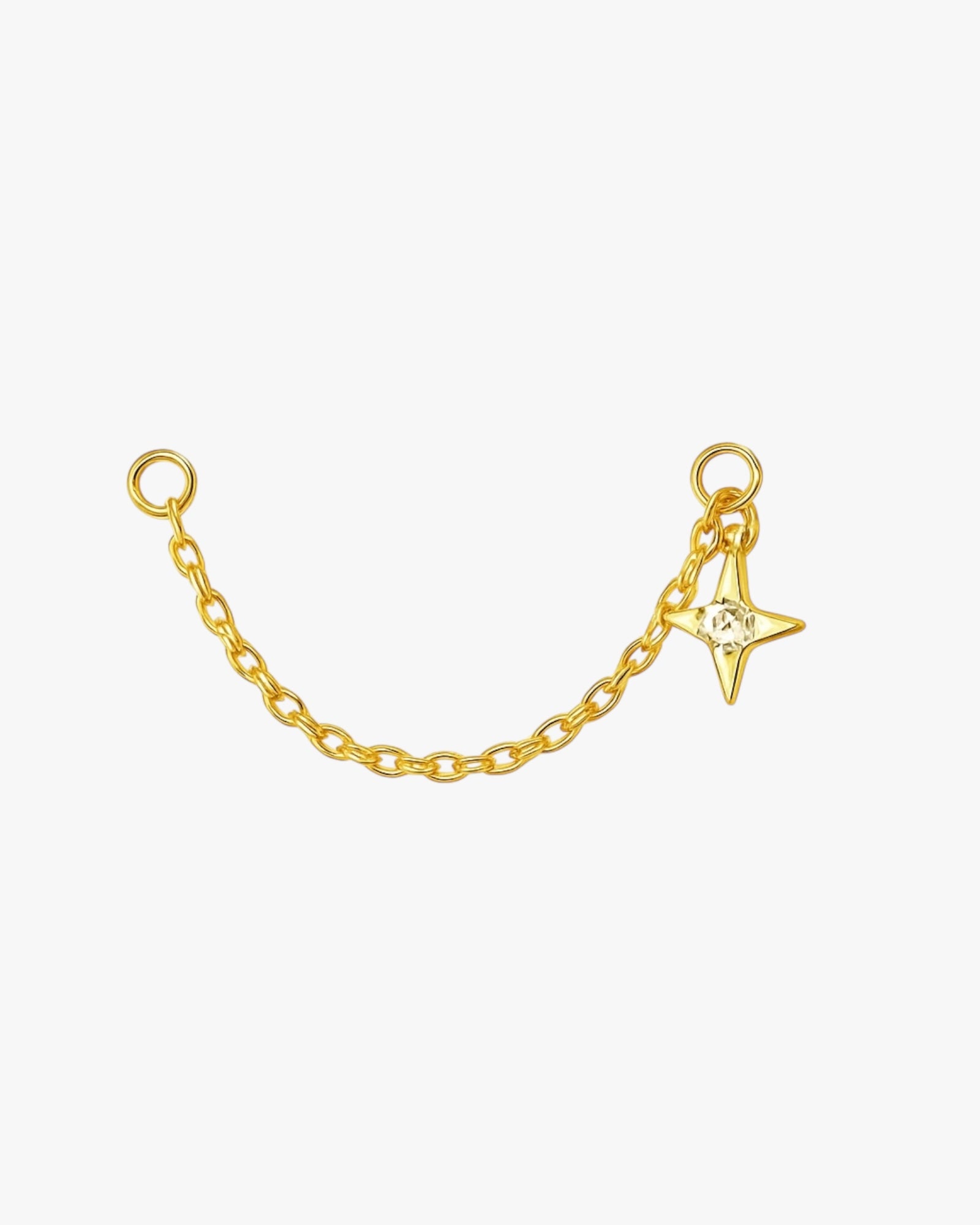 Gold chain with a star-shaped charm on a white background