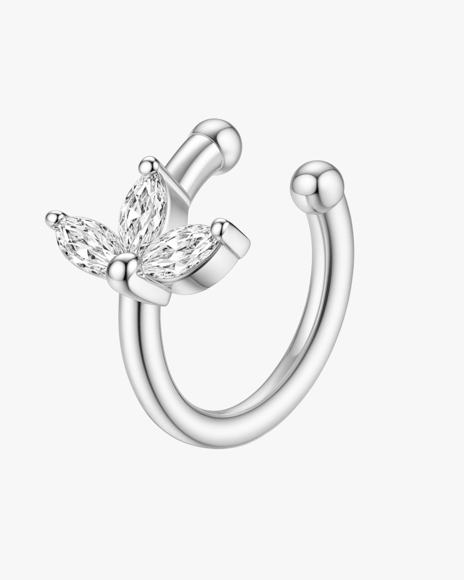 Silver ear cuff with butterfly design on a white background