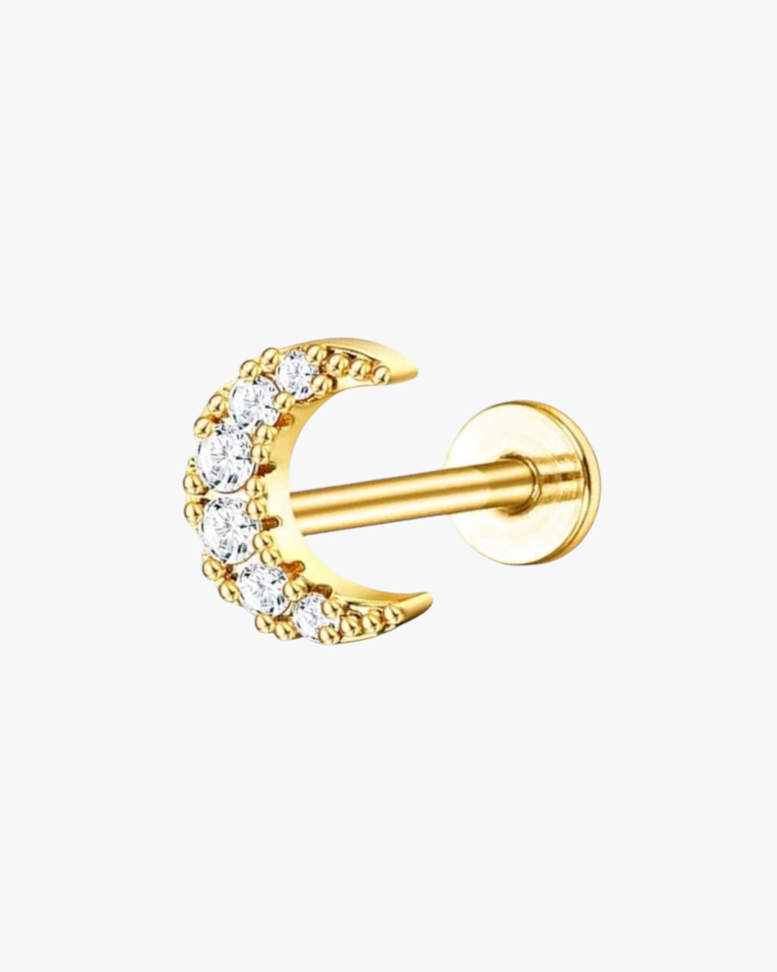 A gold-colored stainless steel stud earring with a clear, ornate design around the top.
