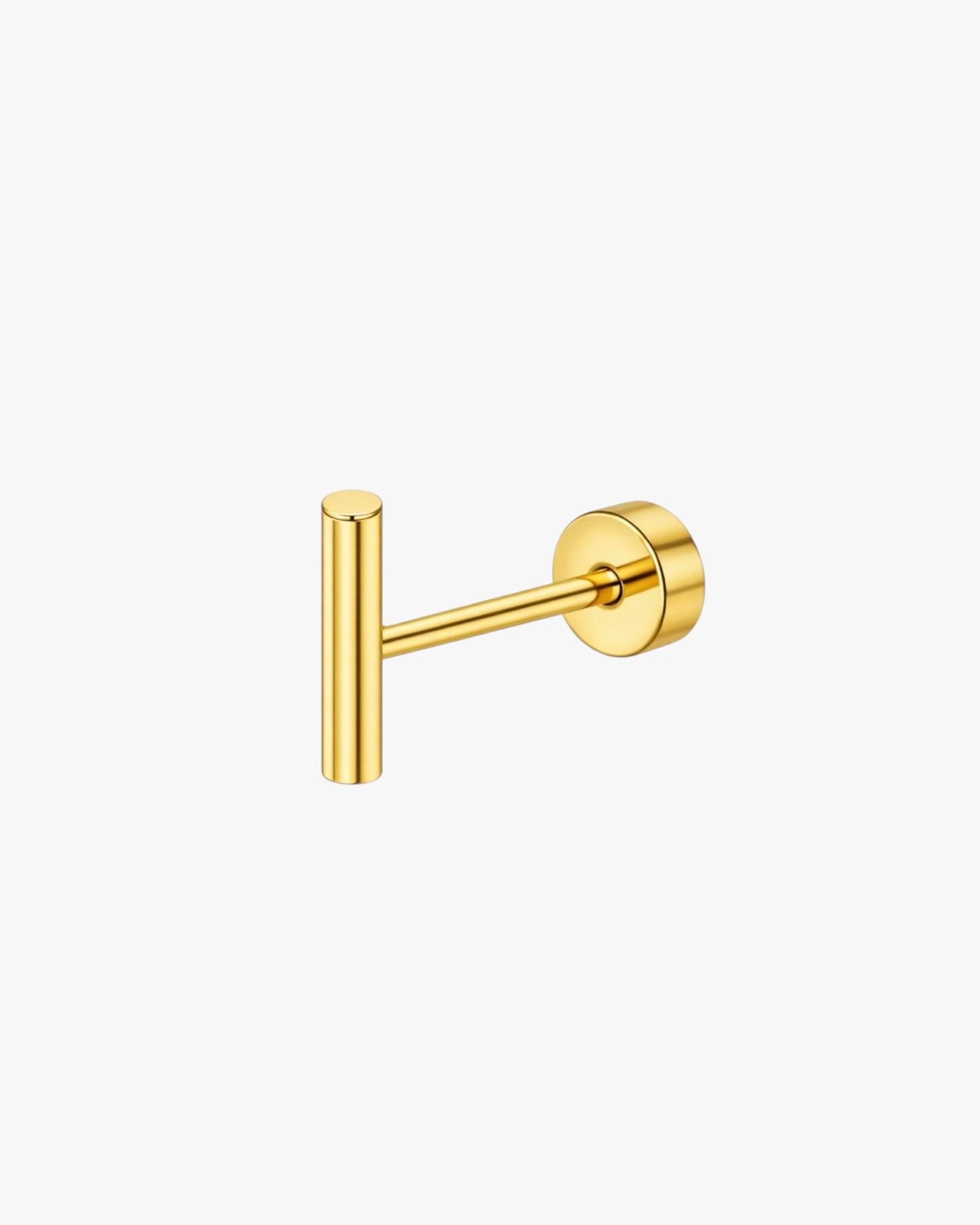 Gold bar stud  on a white background