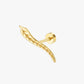 Gold feather-shaped earring on a white background