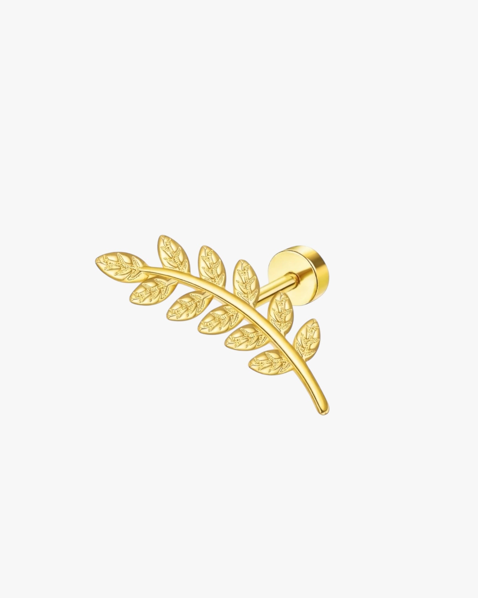 Gold leaf-shaped earring on a white background