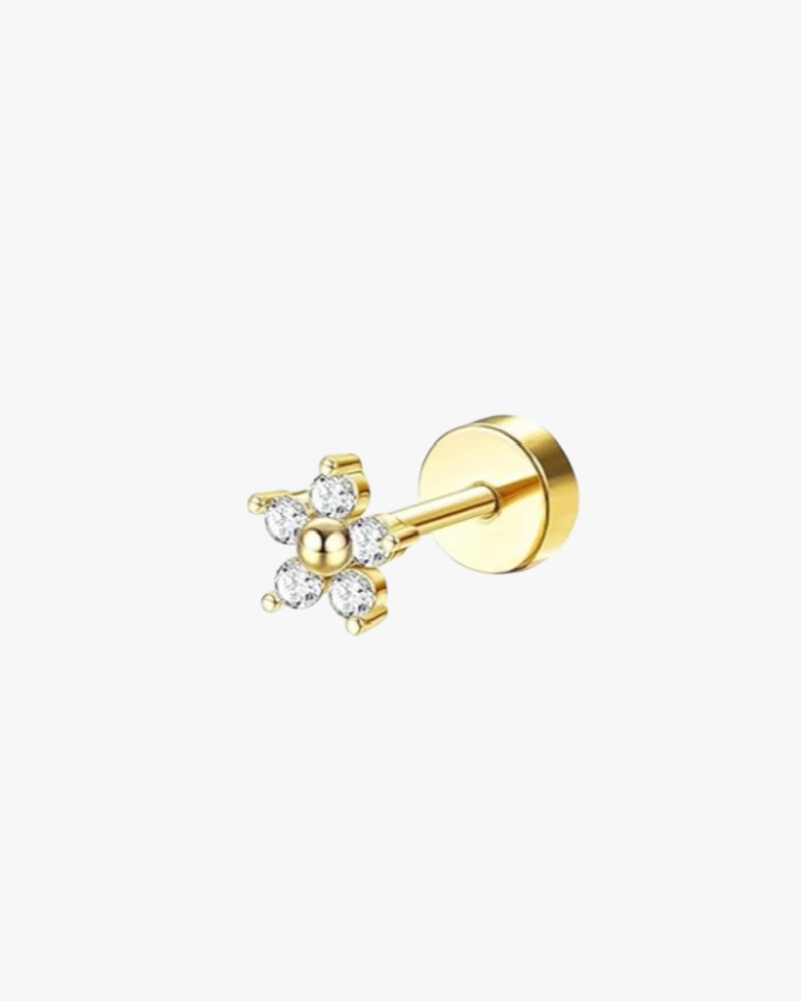 A single gold-colored stainless steel stud earring with a clear, faceted design.
