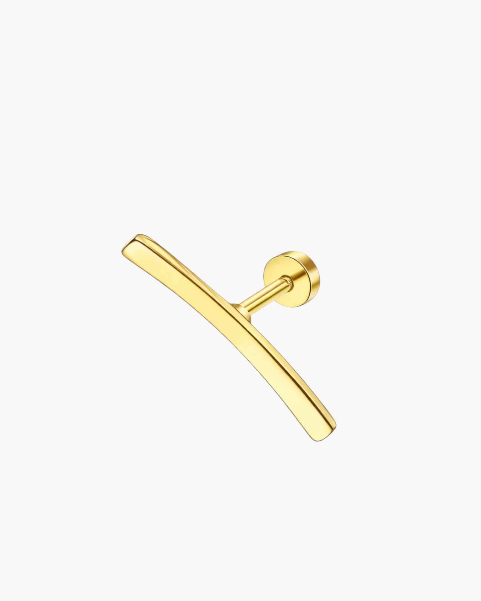 Gold earring on a white background