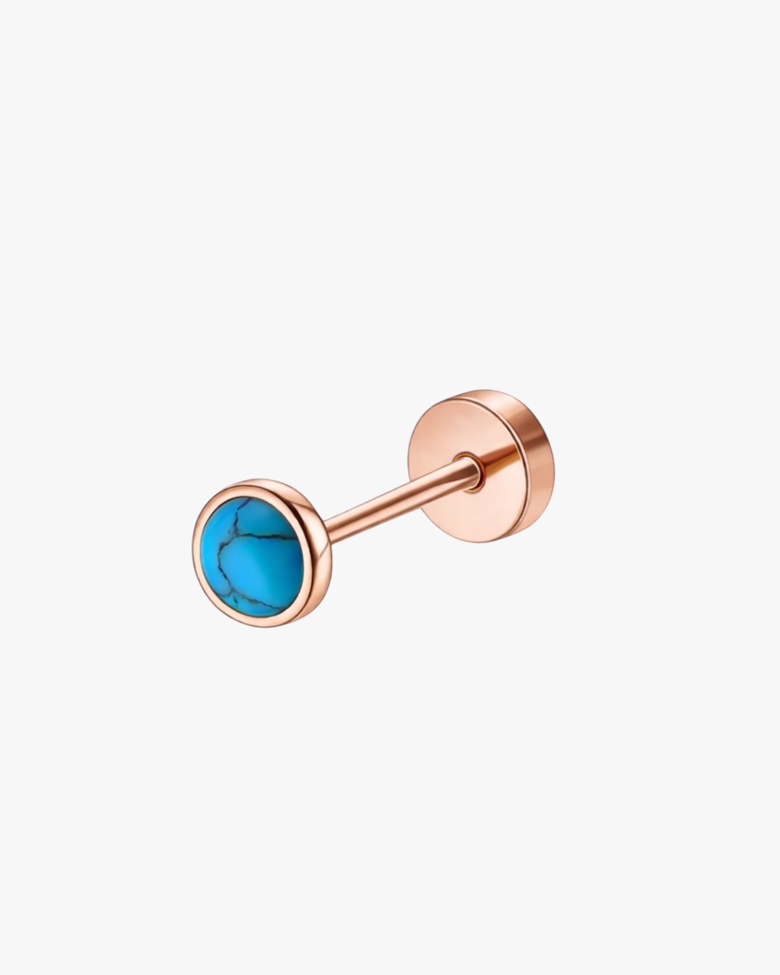 Rose gold stud earring with turquoise gemstone on a white background