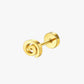 Gold spiral earring on a white background