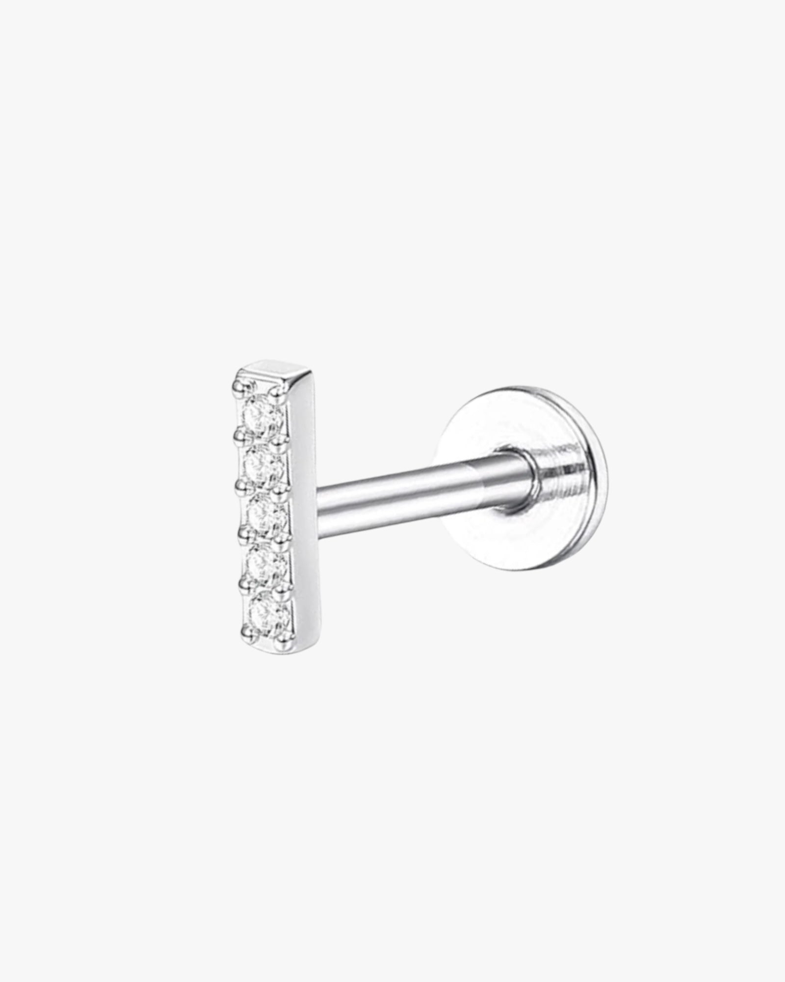 A single silver-colored stainless steel stud earring with a clear, encrusted ball at the end.