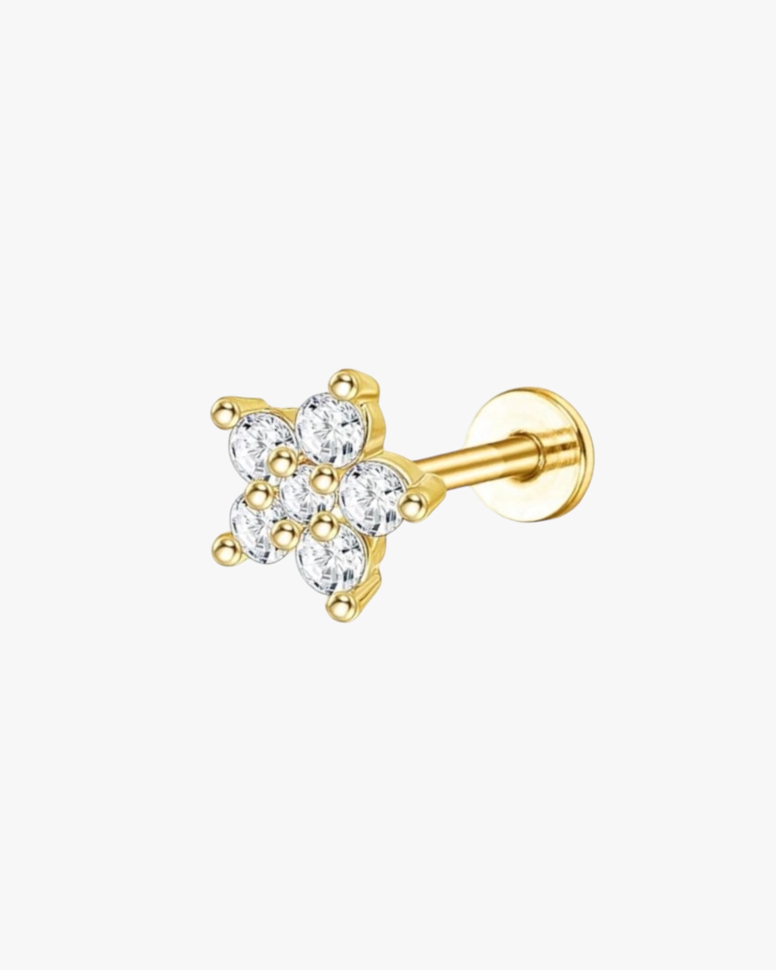 A single gold-colored stud earring with a clear, multicolored gemstone in the center.