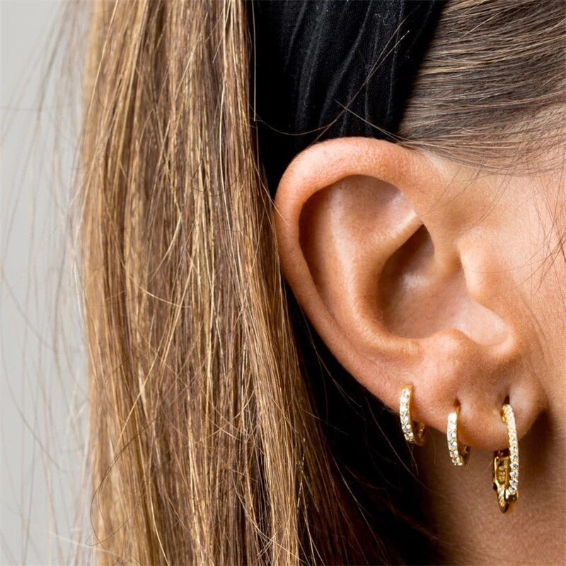 "Image: Gold pave hoops, radiating timeless elegance in ear