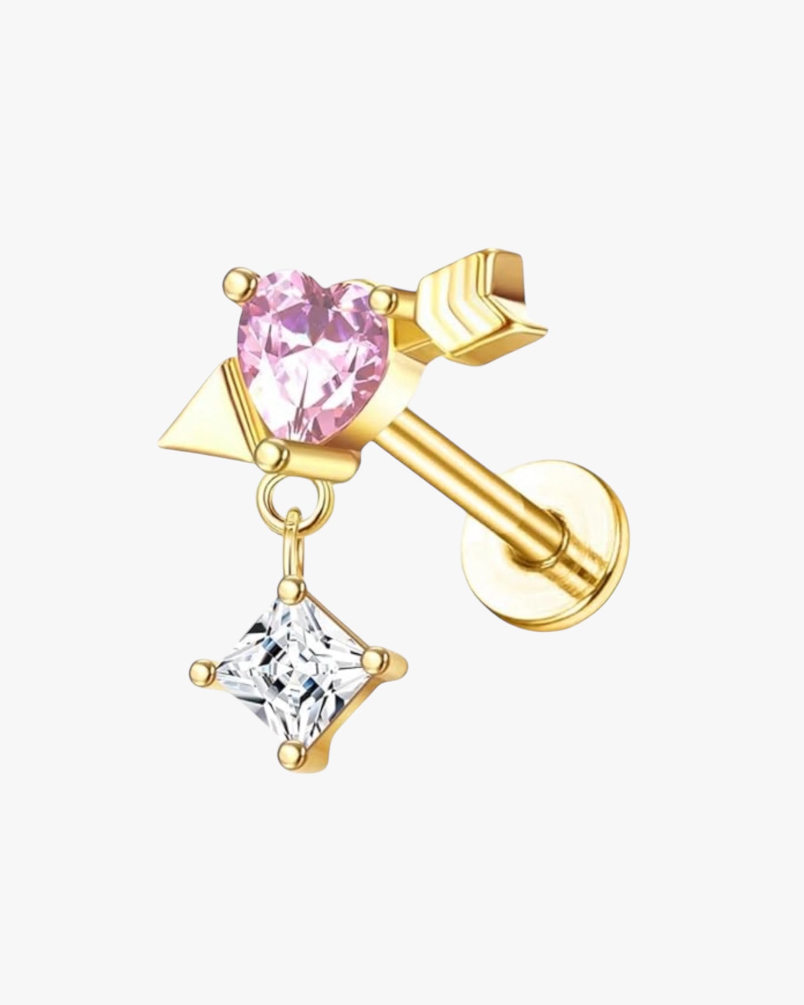 A single gold-colored stud earring with a pink heart gemstone.