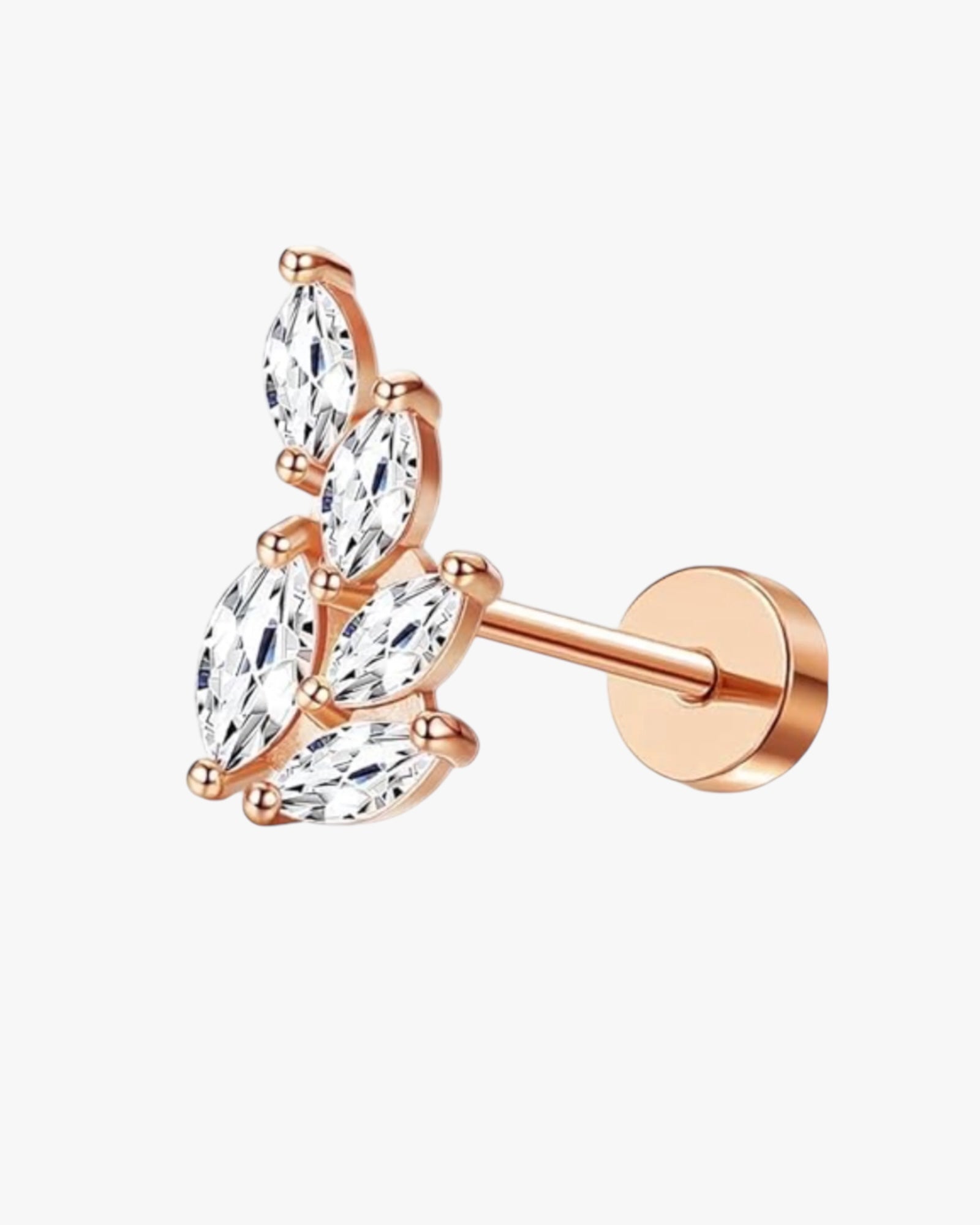 A single gold-colored stud earring with a clear, crystal-encrusted top and a rose gold-colored band.