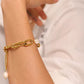 Minimalist gold plated stainless steel bracelet with adjustable extension chain on arm