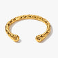 Aurea hammered gold bangle bracelet in gold with 18K gold plated stainless steel statement design