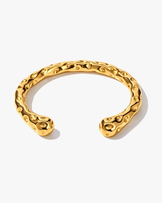 Aurea hammered gold bangle bracelet in gold with 18K gold plated stainless steel statement design