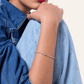 Gold Plated Stainless Steel Bracelet worn on a persons wrist