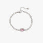 Serelina gold tennis bracelet with pink zircon center stone and 18K gold plated stainless steel