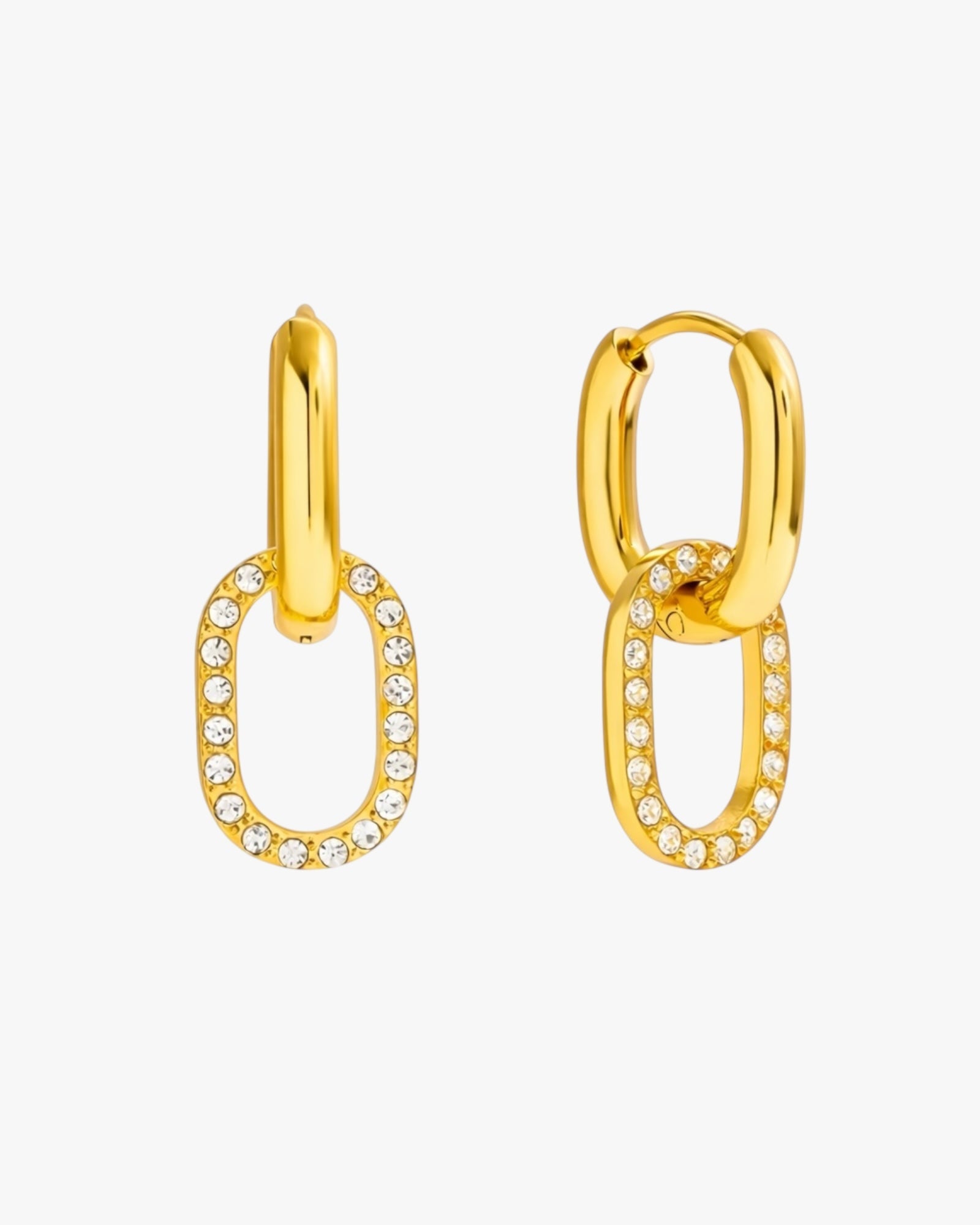 Gold drop earrings with oval zircon pendant