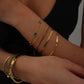 Adjustable gold plated stainless steel chain bracelet with modern minimalist style on arm