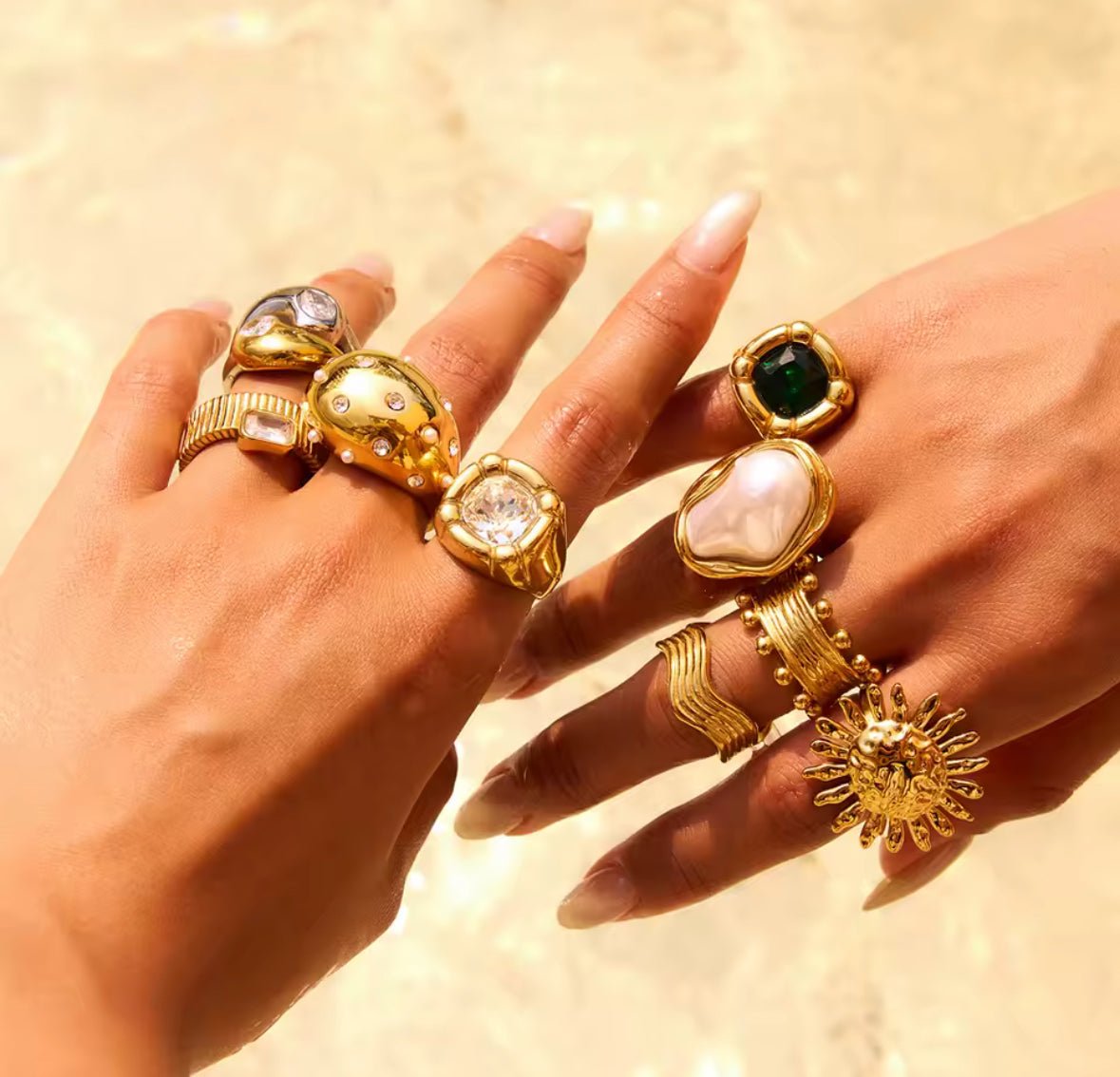Gold plated crystal statement ring on finger